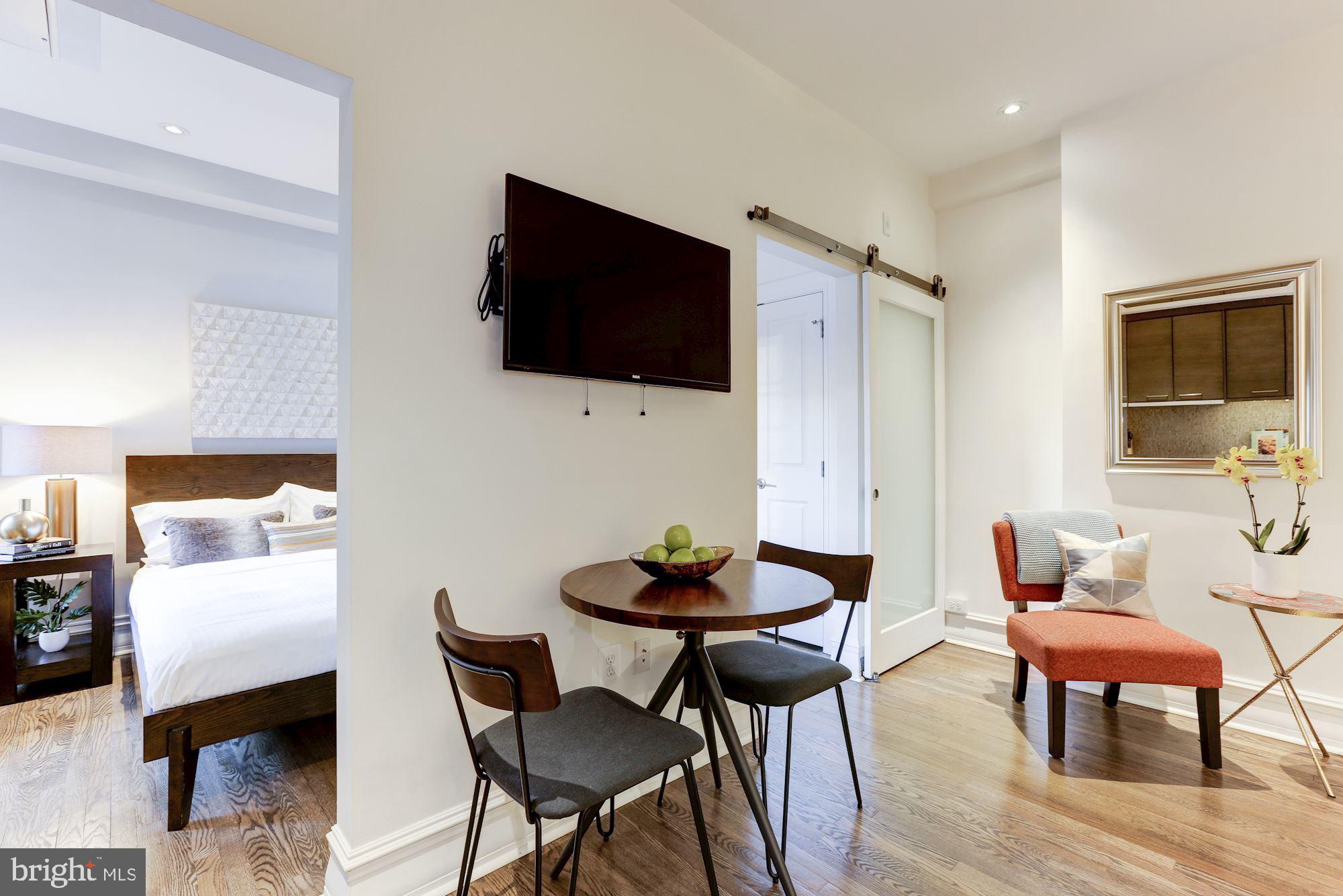 1801 16th Street Northwest, Unit 203 Washington, DC 20009 - Photo 5 of 21 Bright and airy flow throughout