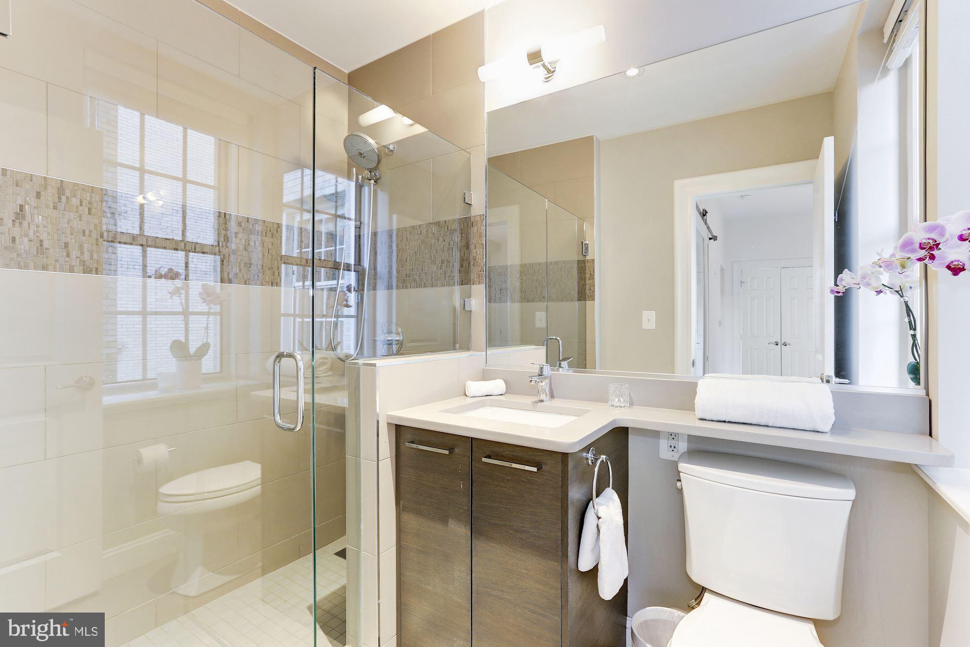 1801 16th Street Northwest, Unit 203 Washington, DC 20009 - Photo 8 of 21 with walk-in glass shower