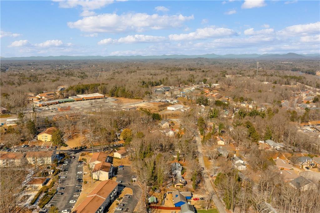 1706 Cleveland Highway Gainesville, GA 30501 - Photo 20 of 25 an aerial view of residential houses with outdoor space