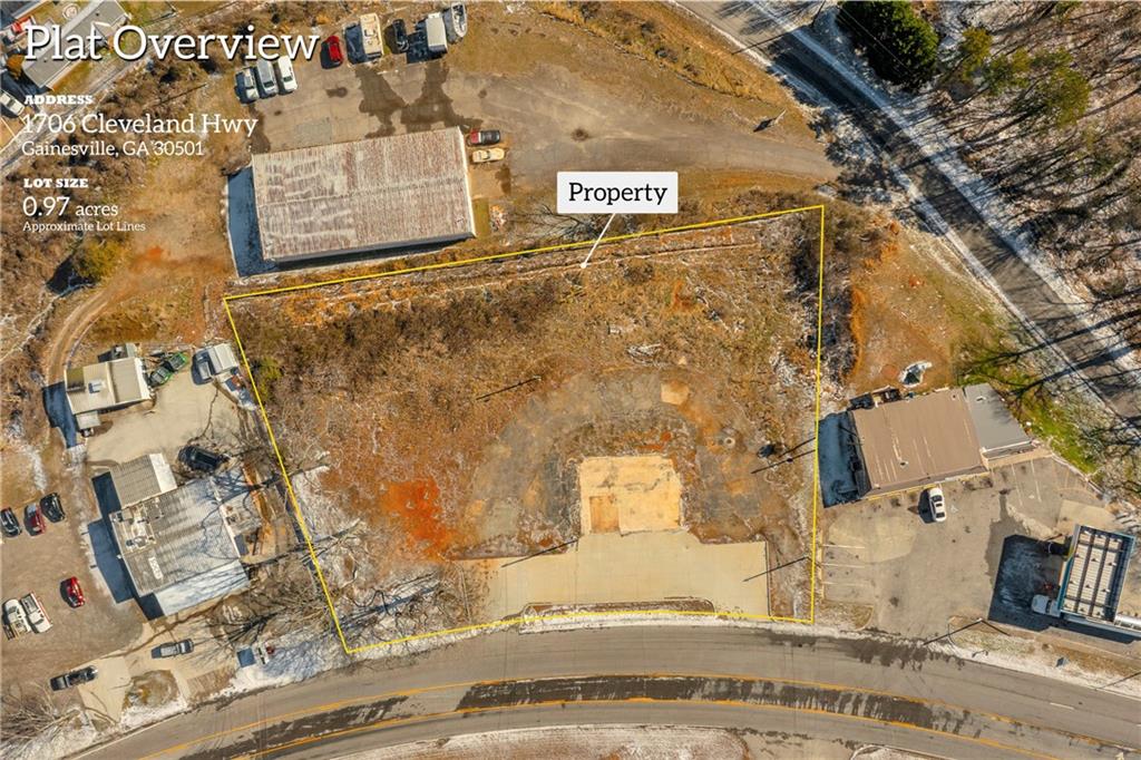 1706 Cleveland Highway Gainesville, GA 30501 - Photo 2 of 25 a sign that is on a brick wall