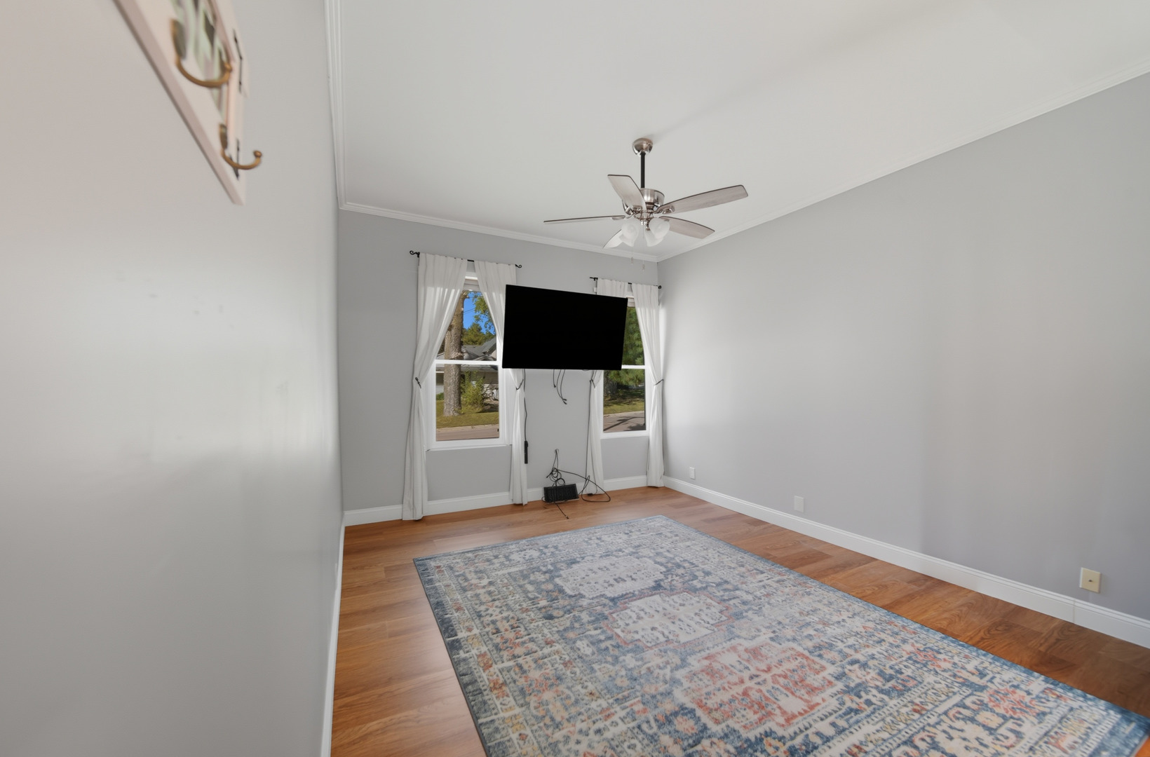 318 East McKenney Street Dixon, IL 61021 - Photo 11 of 36 wooden floor in an empty room with a window