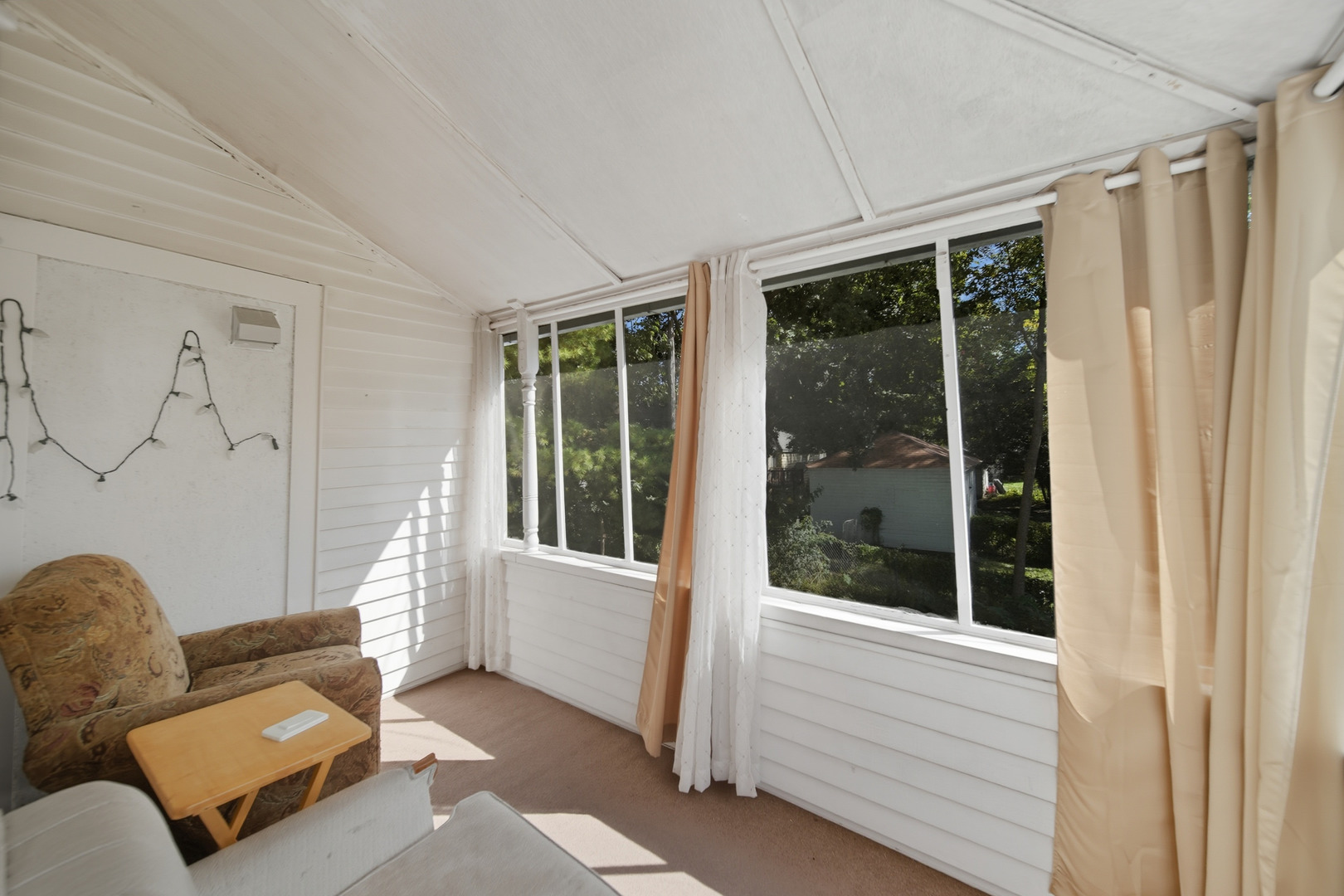 318 East McKenney Street Dixon, IL 61021 - Photo 19 of 36 a living room with furniture and a window