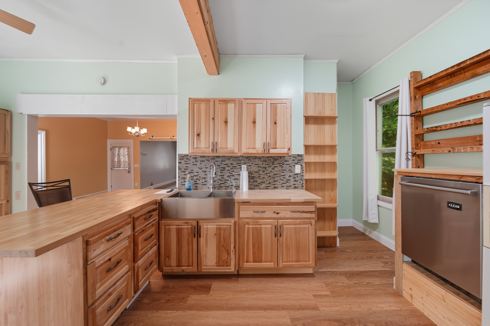 318 East McKenney Street Dixon, IL 61021 - Photo 21 of 36 a kitchen with stainless steel appliances granite countertop a stove a sink and a refrigerator