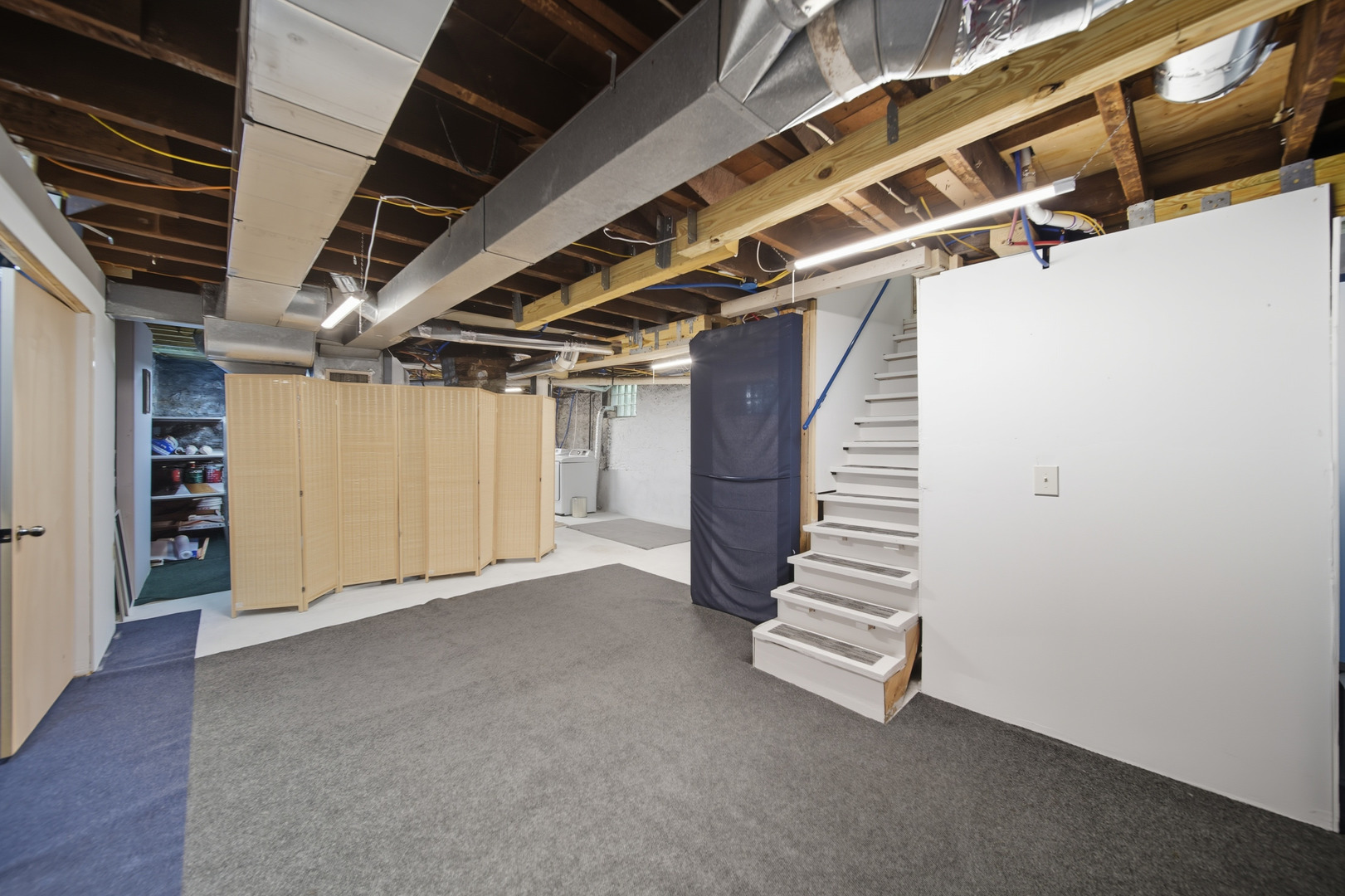 318 East McKenney Street Dixon, IL 61021 - Photo 29 of 36 a view of empty room with stairs and wooden floors