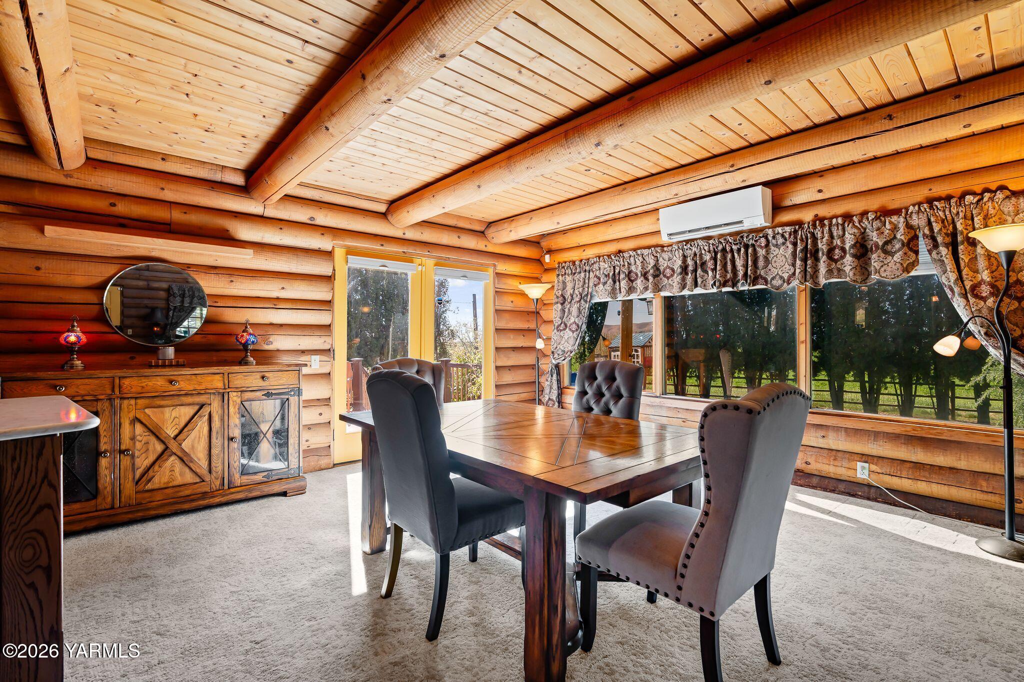 2550 Kays Road Wapato, WA 98951 - Photo 10 of 52 a dining room with furniture and wooden floor
