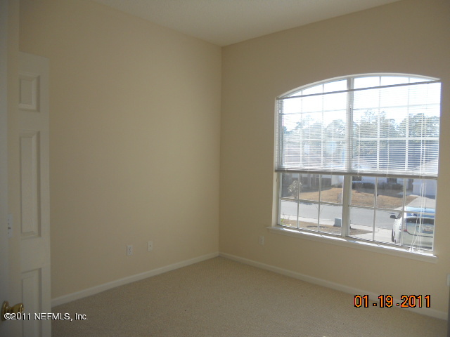 2911 Ravine Hill Drive Middleburg, FL 32068 - Photo 5 of 9 an empty room with a window