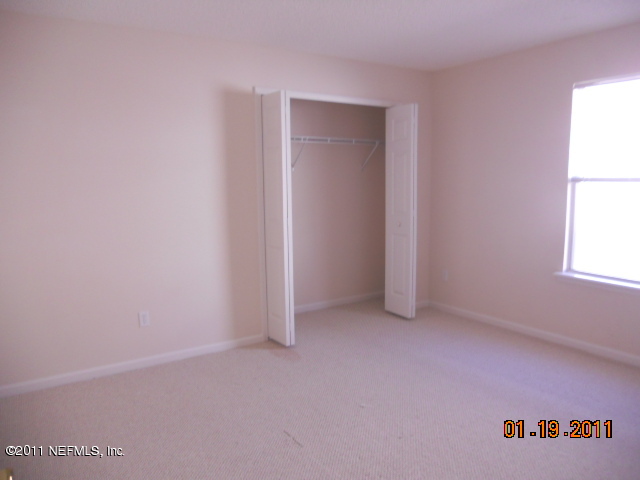 2911 Ravine Hill Drive Middleburg, FL 32068 - Photo 8 of 9 a view of an empty room with a window
