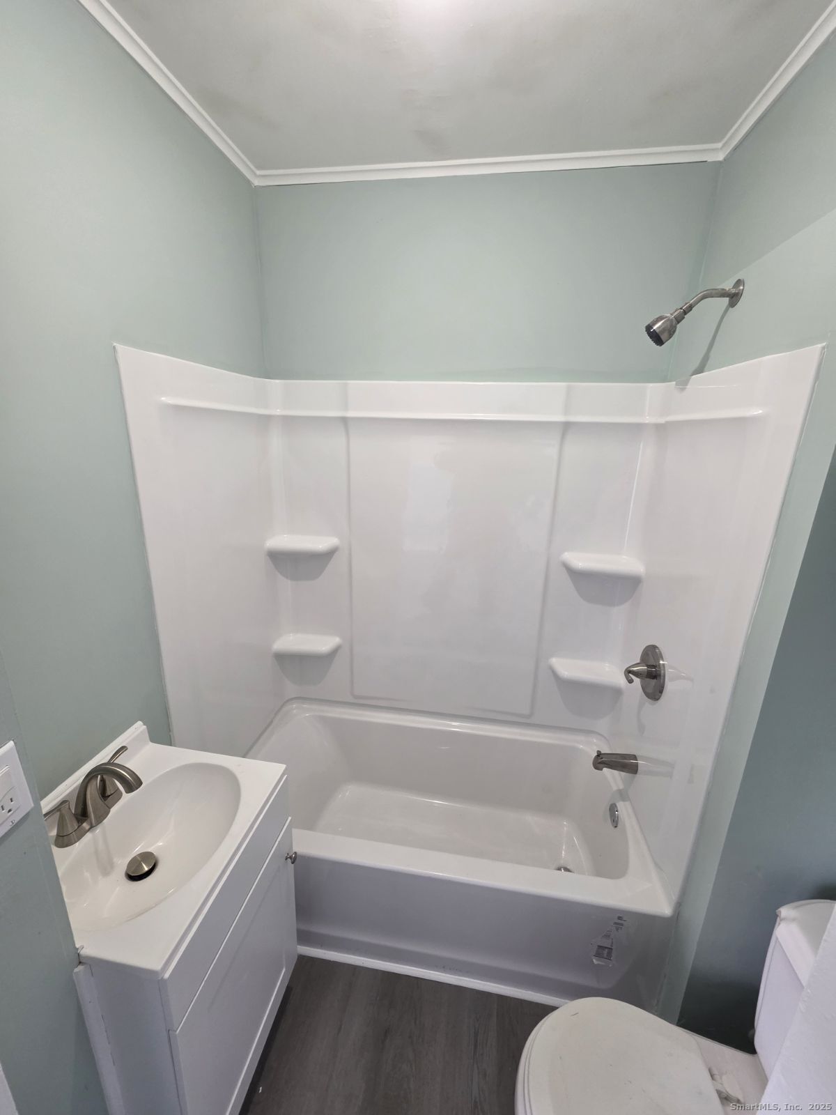 21 Pearl Street, Unit 2A Torrington, CT 06790 - Photo 4 of 4 a bathroom with a bathtub and toilet
