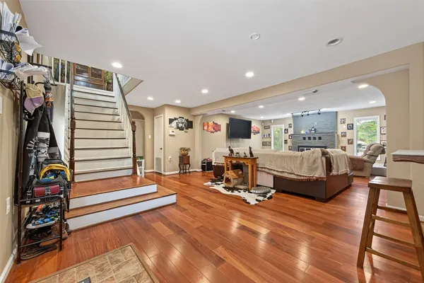 a living room with furniture and a table