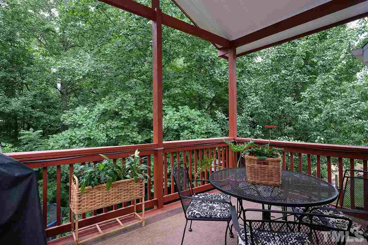 7924 Milltrace Run Raleigh, NC 27615 - Photo 23 of 25 a view of a two chairs in the deck