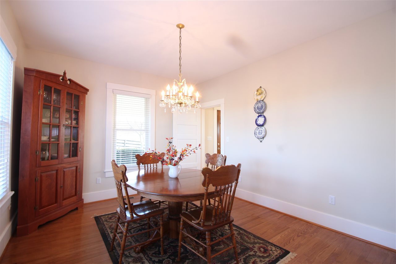 1508 Howardsville Road Staunton, VA 24401 - Photo 5 of 24 a view of a dining room with furniture and chandelier