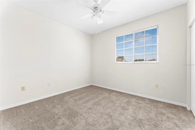 a bathroom with a sink toilet vanity and shower