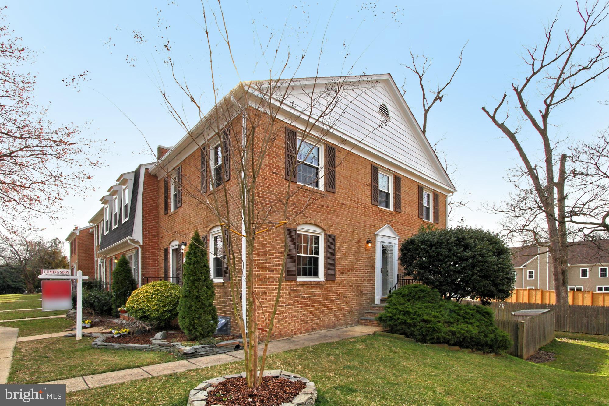 7013 Leestone Street Springfield, VA 22151 - Photo 1 of 36 a front view of a house with garden