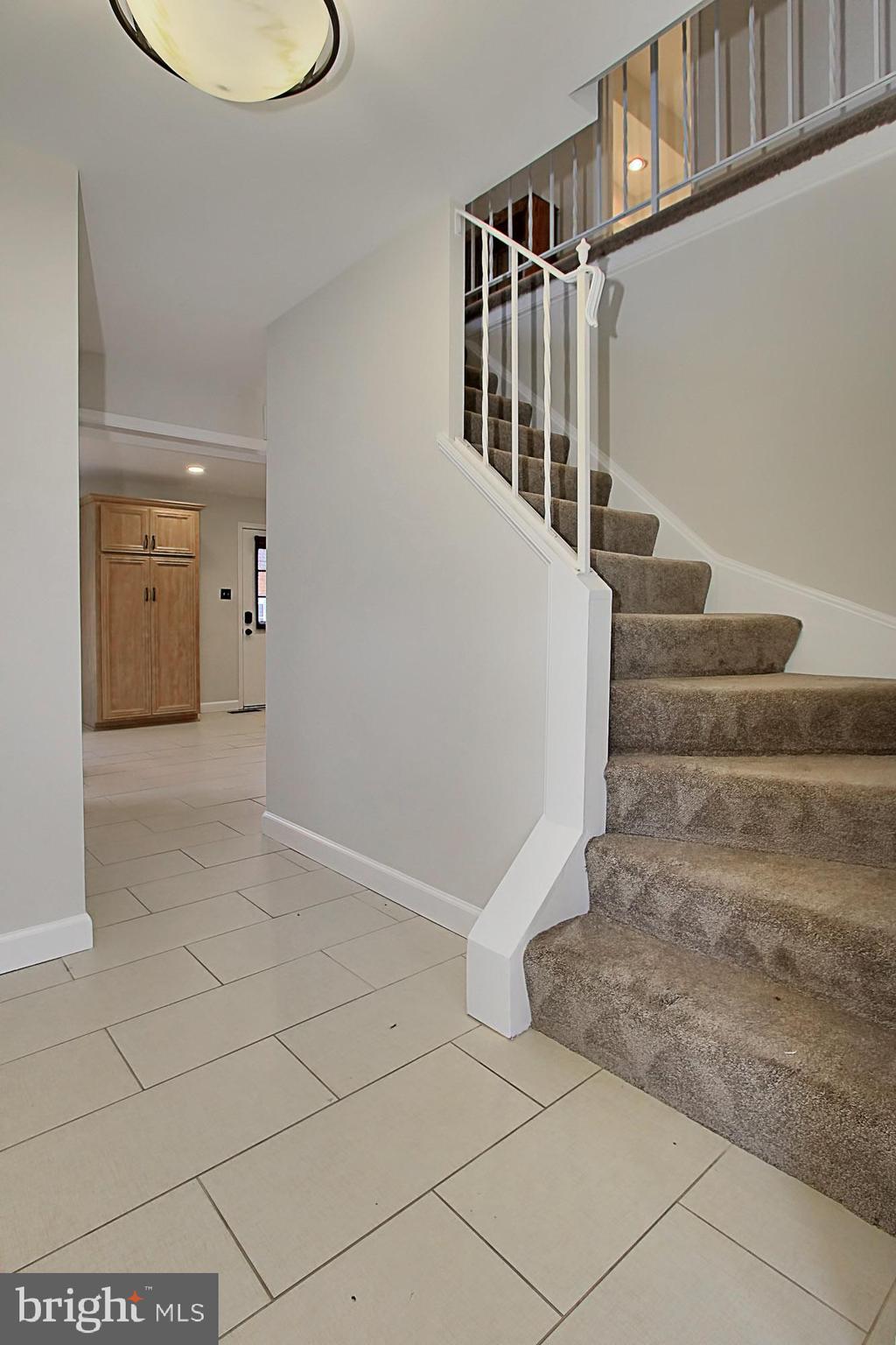 7013 Leestone Street Springfield, VA 22151 - Photo 17 of 36 a view of entryway with a front door