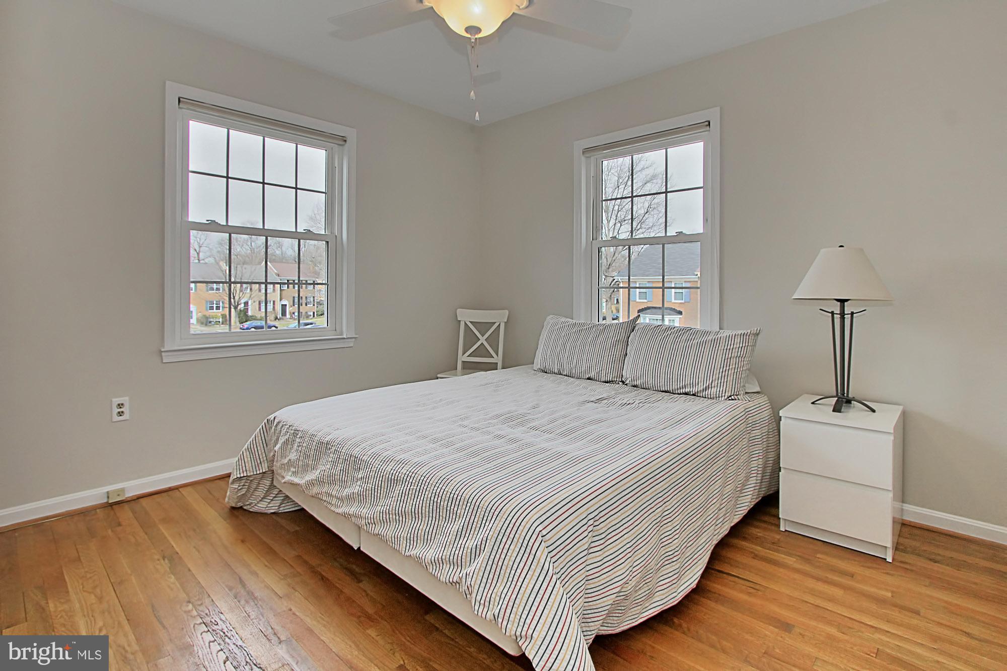 7013 Leestone Street Springfield, VA 22151 - Photo 25 of 36 a bedroom with a bed and a window