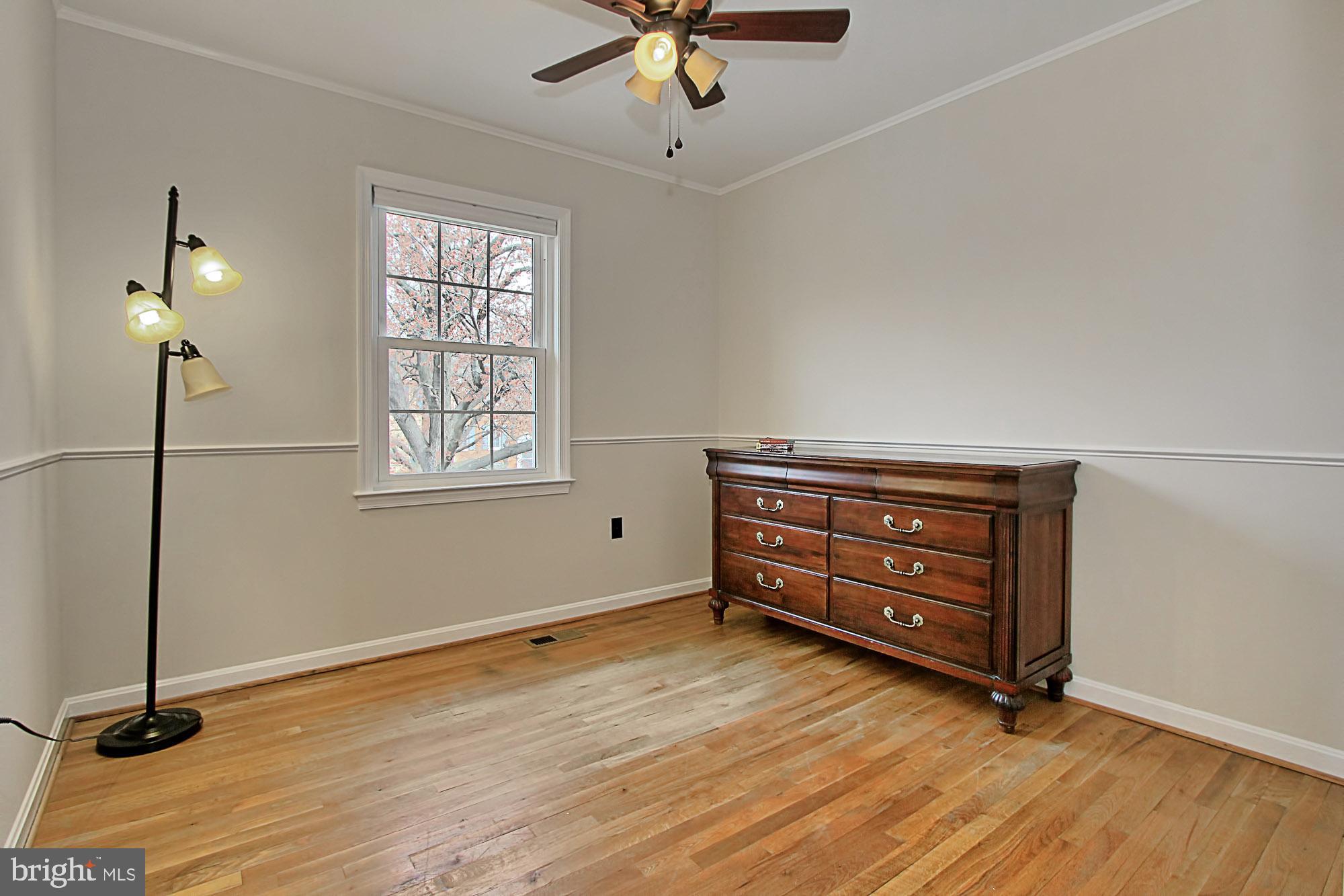 7013 Leestone Street Springfield, VA 22151 - Photo 27 of 36 an empty room with windows