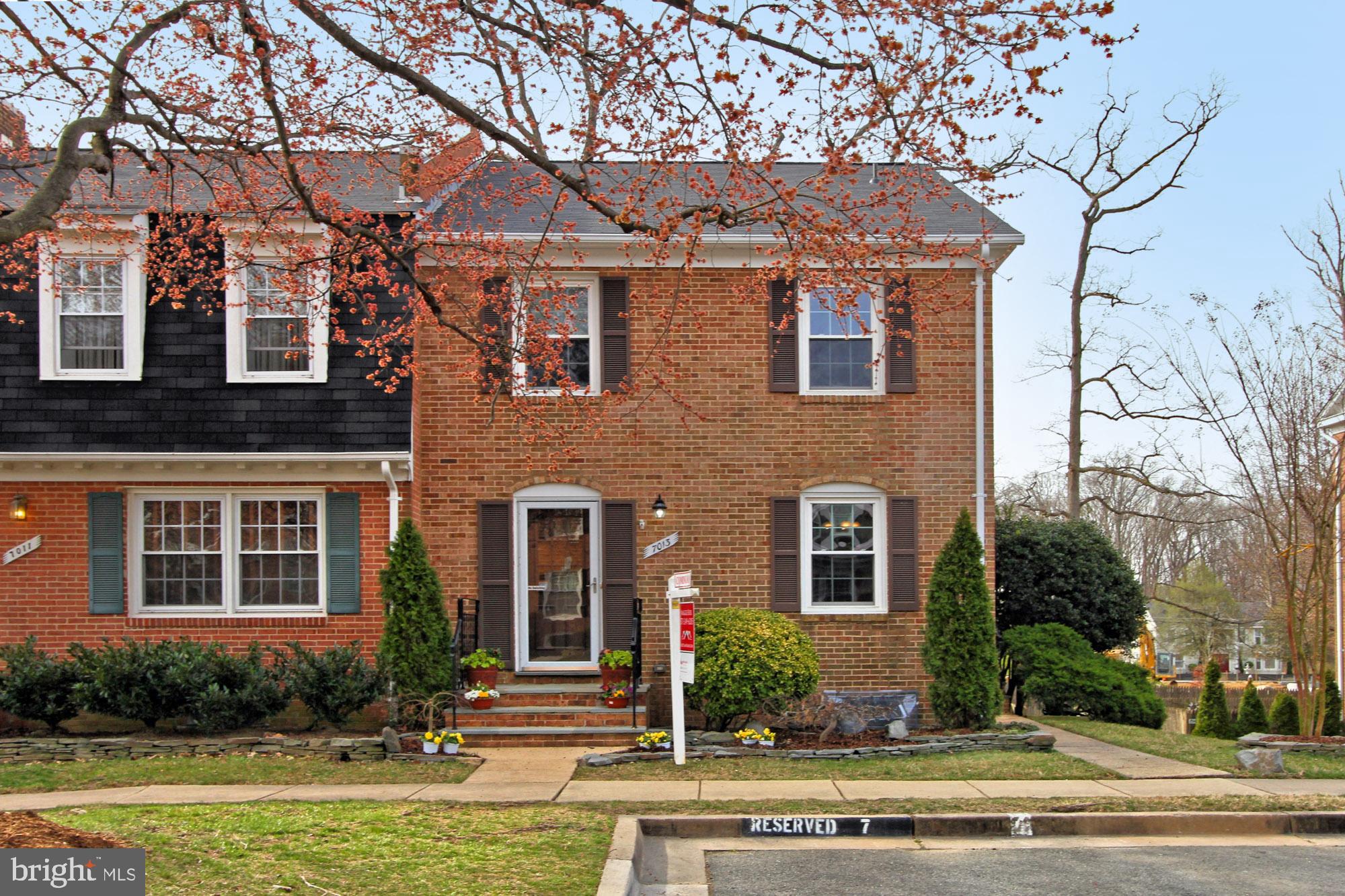 7013 Leestone Street Springfield, VA 22151 - Photo 36 of 36 front view of a house with a yard