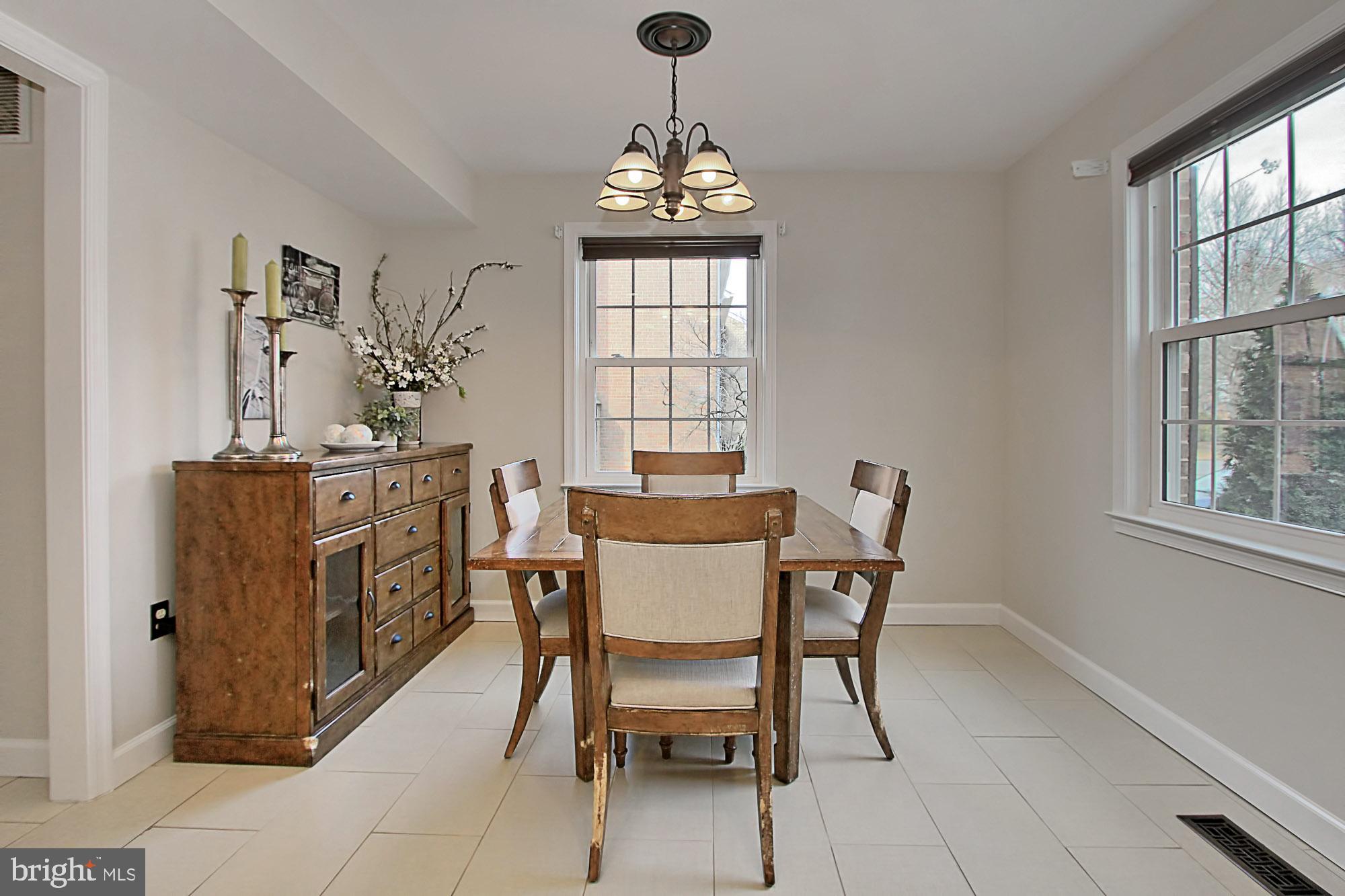 7013 Leestone Street Springfield, VA 22151 - Photo 9 of 36 a dining room with furniture and window