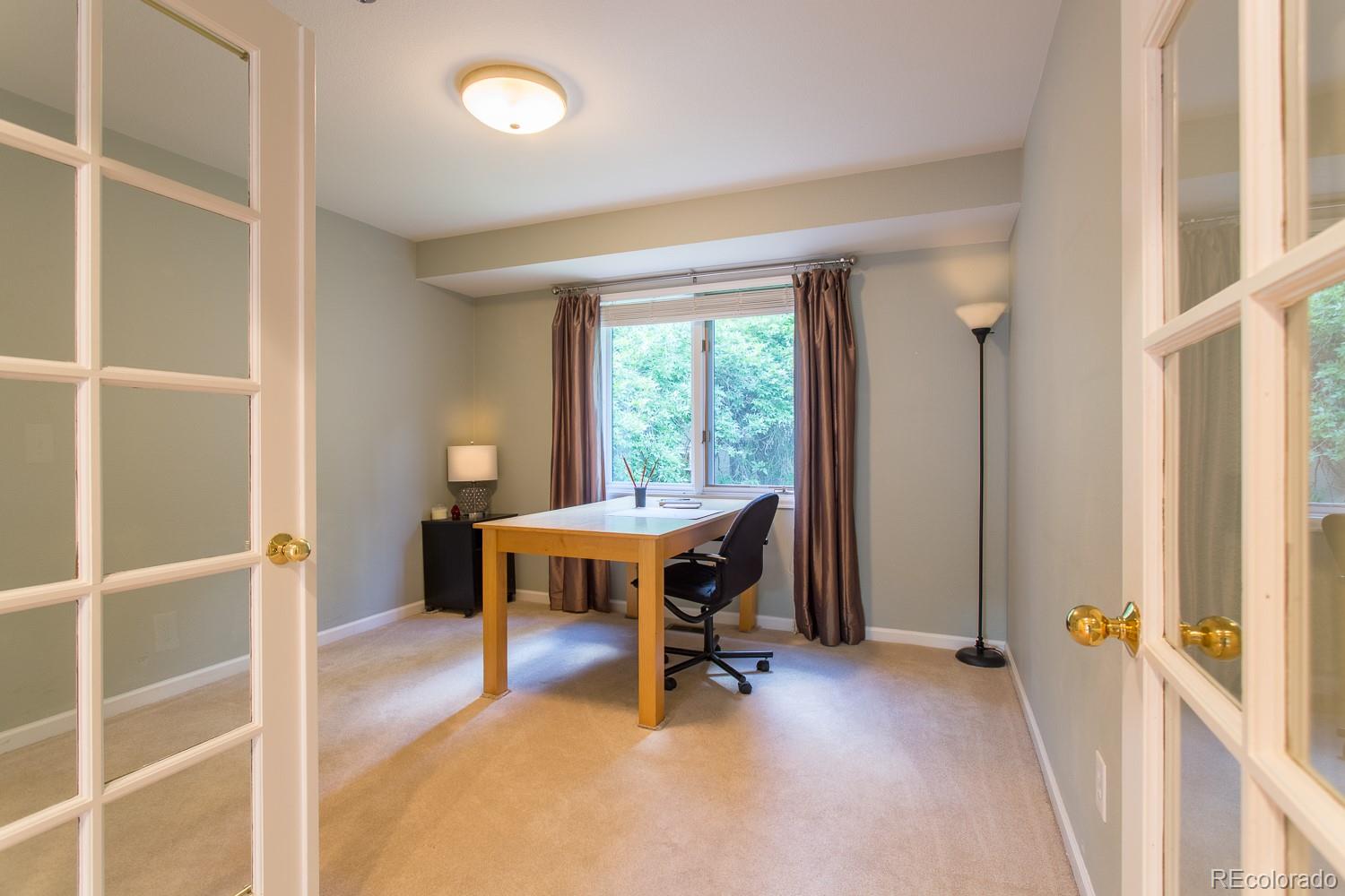 1151 Juniper Avenue Boulder, CO 80304 - Photo 12 of 37 a view of a room with wooden floor and furniture