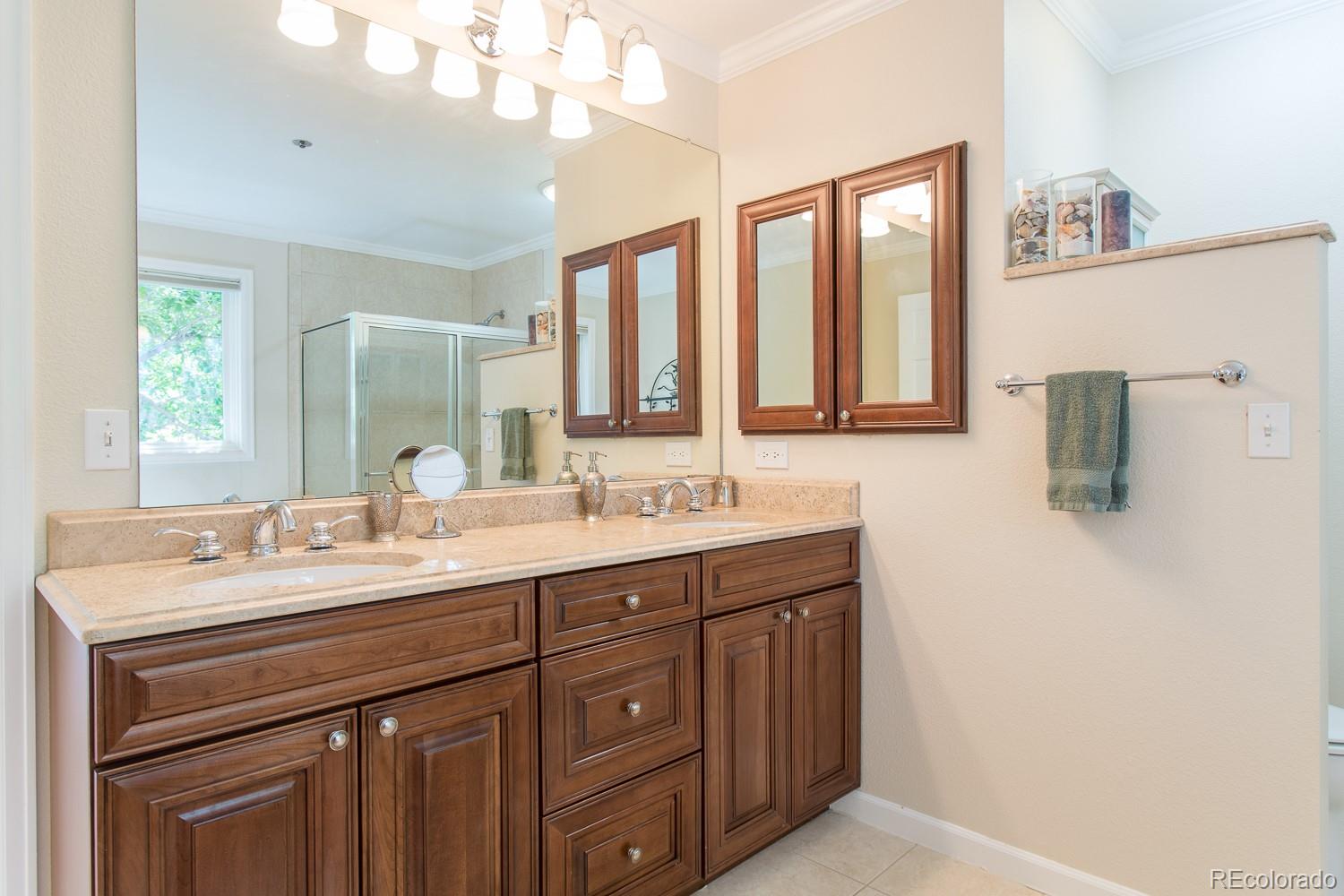 1151 Juniper Avenue Boulder, CO 80304 - Photo 15 of 37 a bathroom with a sink double vanity and a mirror
