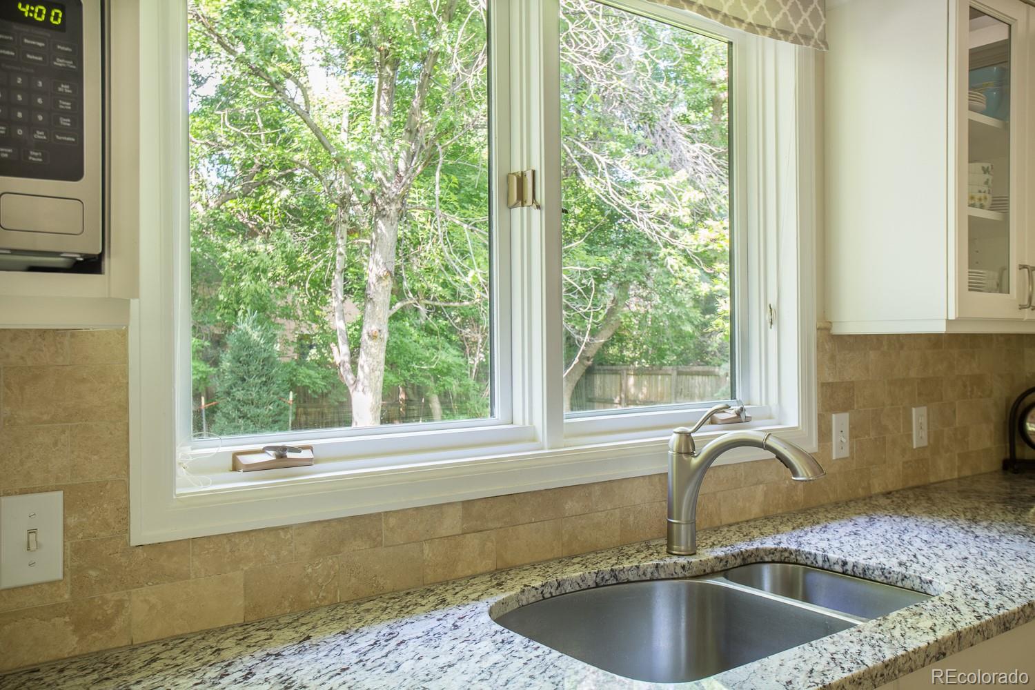1151 Juniper Avenue Boulder, CO 80304 - Photo 26 of 37 a kitchen with a sink and a window