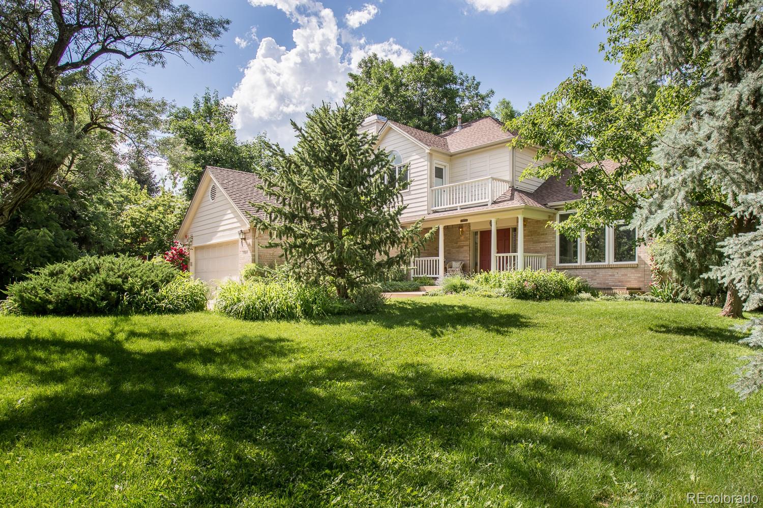 1151 Juniper Avenue Boulder, CO 80304 - Photo 27 of 37 a front view of a house with a yard