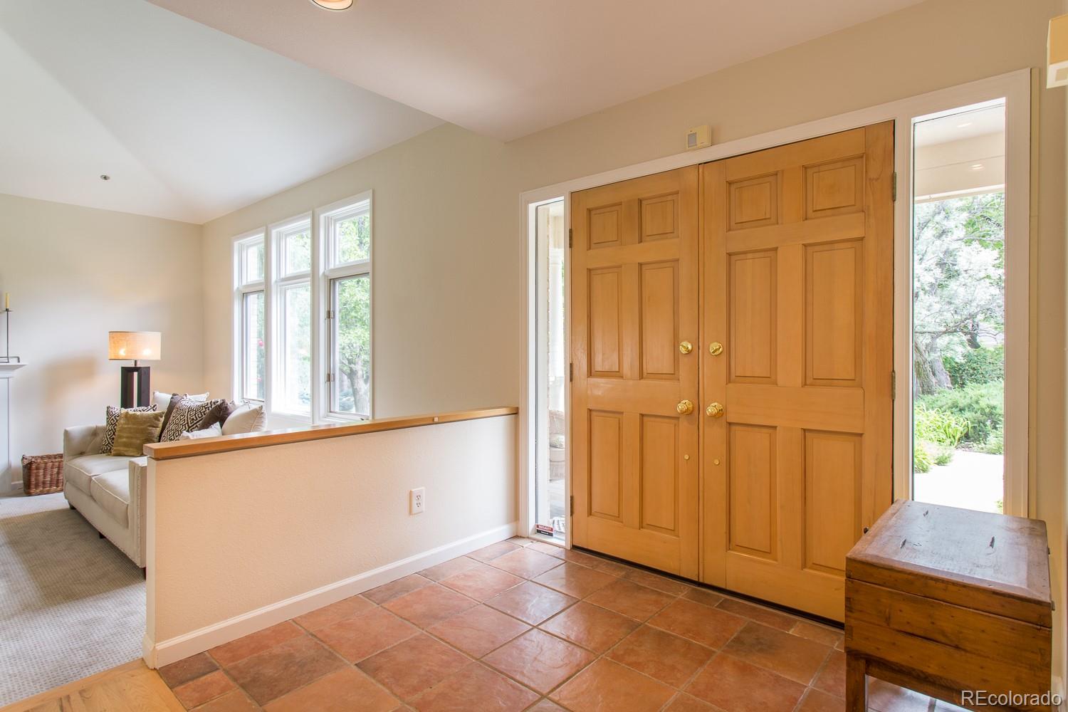 1151 Juniper Avenue Boulder, CO 80304 - Photo 4 of 37 a view of a kitchen with an empty room and a window