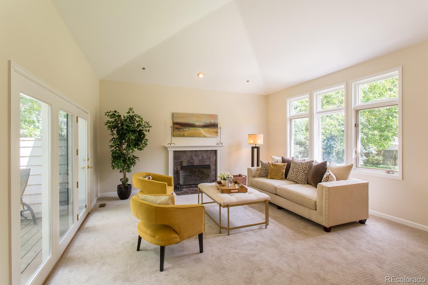 1151 Juniper Avenue Boulder, CO 80304 - Photo 5 of 37 a living room with furniture and a fireplace