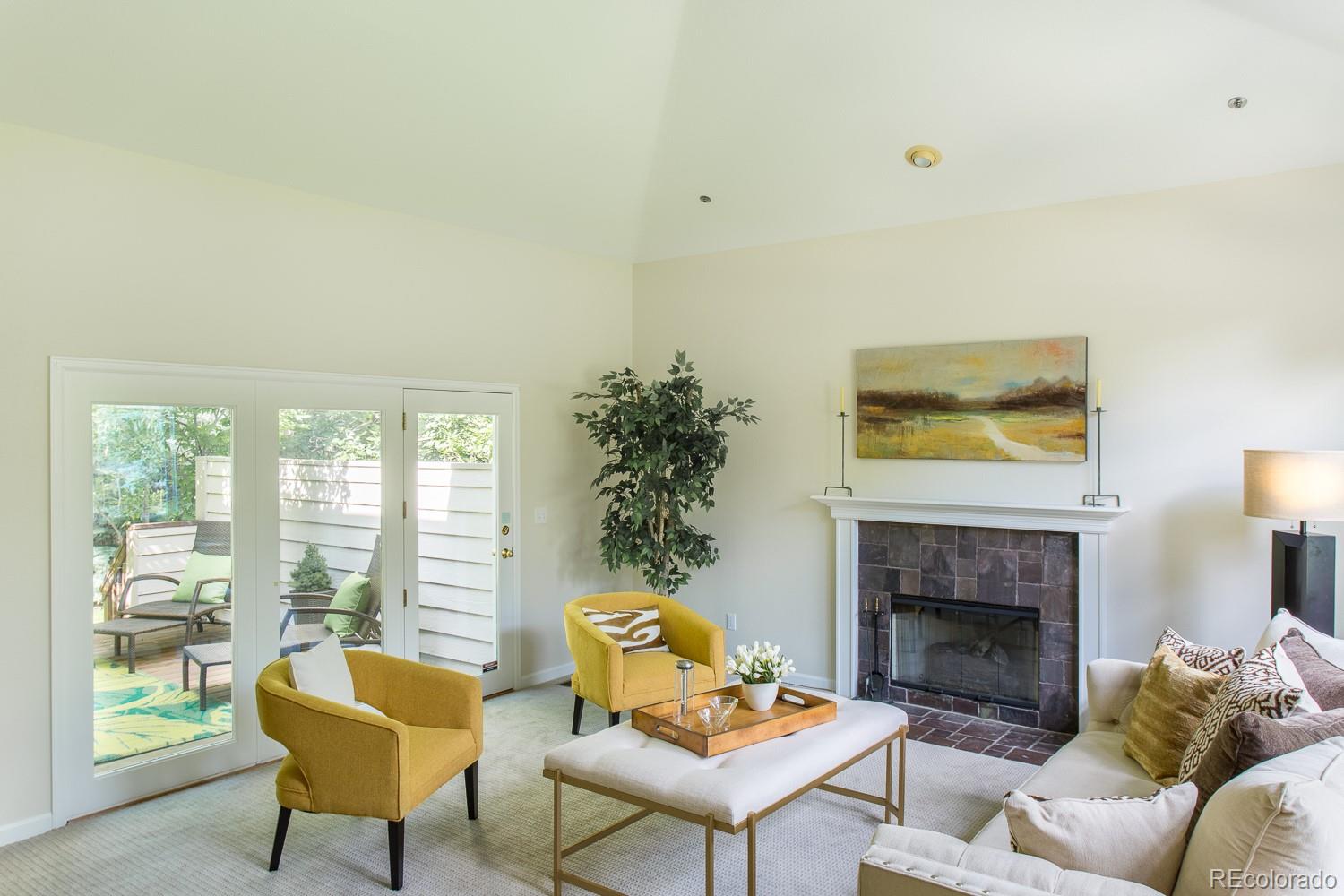 1151 Juniper Avenue Boulder, CO 80304 - Photo 6 of 37 a living room with furniture and a fireplace