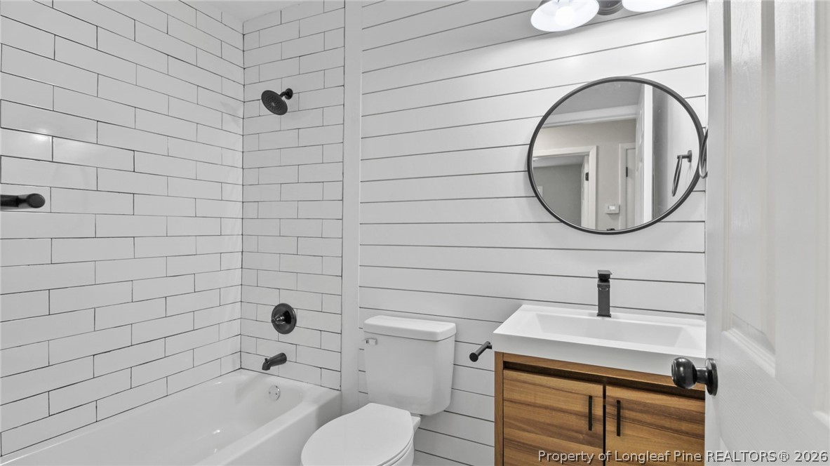 3610 Yorktown Road Hope Mills, NC 28348 - Photo 16 of 30 a bathroom with a sink toilet and a mirror