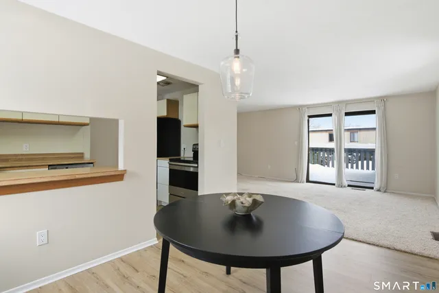 a workspace with furniture and window