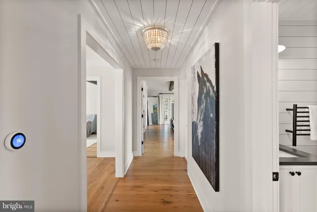 a view of a brick house with a large window