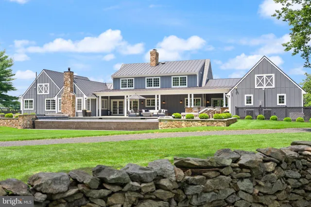 a view of a house with a big yard