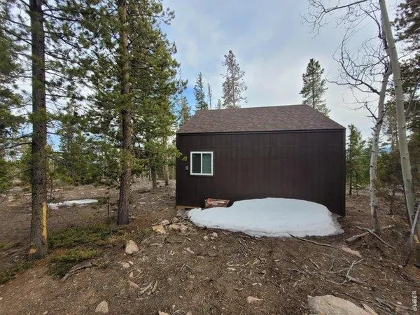 a black and white photo of a house