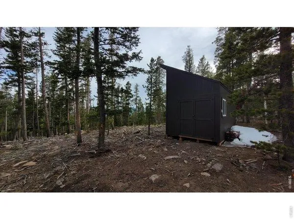 a kitchen with a sink and refrigerator