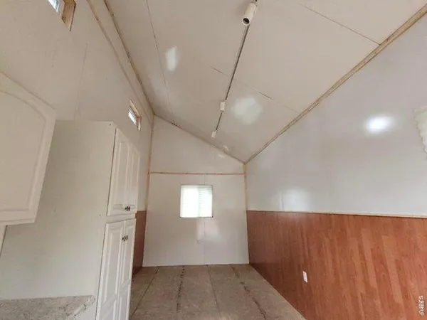 a view of a kitchen with a sink