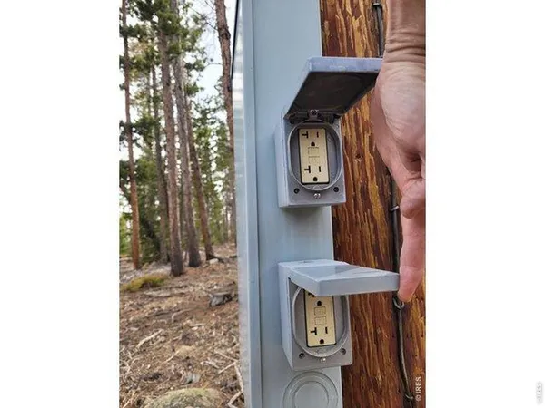 a view of a hallway with washer and dryer