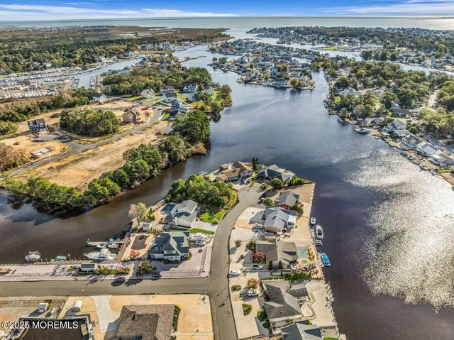 a view of a livingroom with furniture and a window