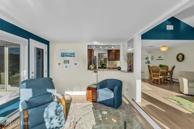 a dining room with a table and chairs
