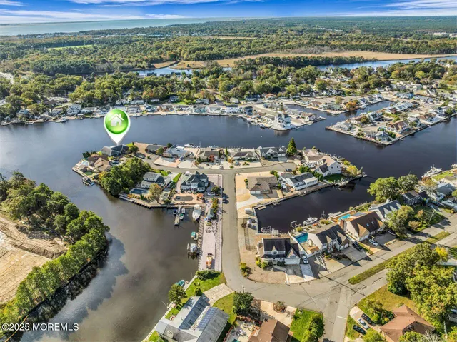 a aerial view of a house with a swimming pool