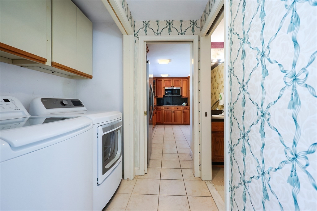 93 Potter Pond, Unit 93 Lexington, MA 02421 - Photo 21 of 42 a view of storage and utility room