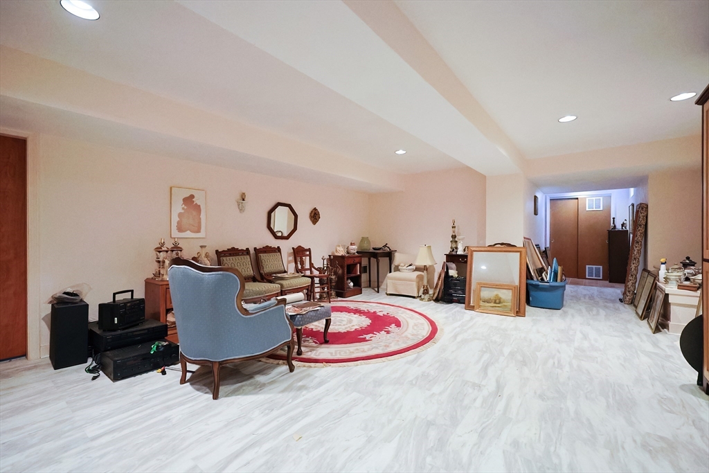 93 Potter Pond, Unit 93 Lexington, MA 02421 - Photo 37 of 42 a view of a dining room with furniture