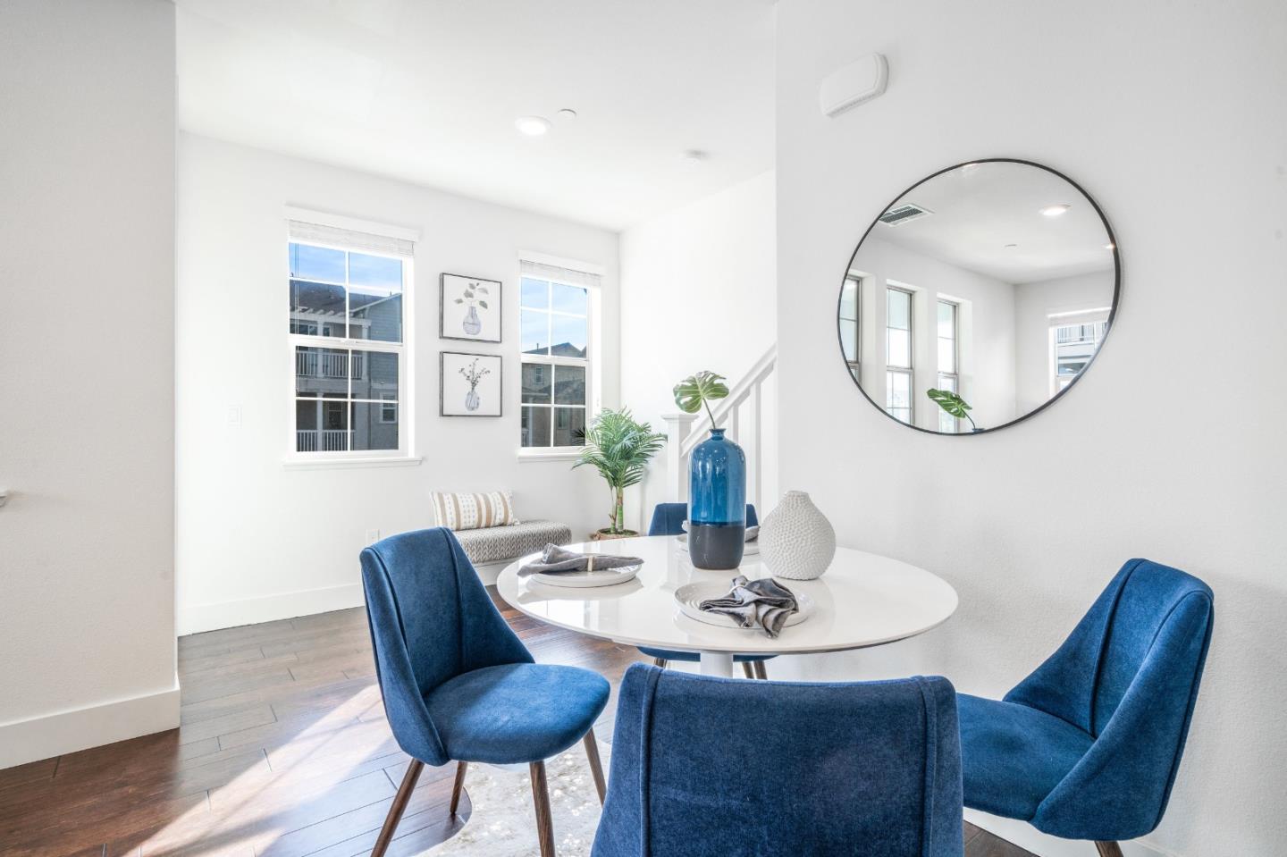 8553 Seawind Way Newark, CA 94560 - Photo 12 of 30 a view of a dining room with furniture and wooden floor