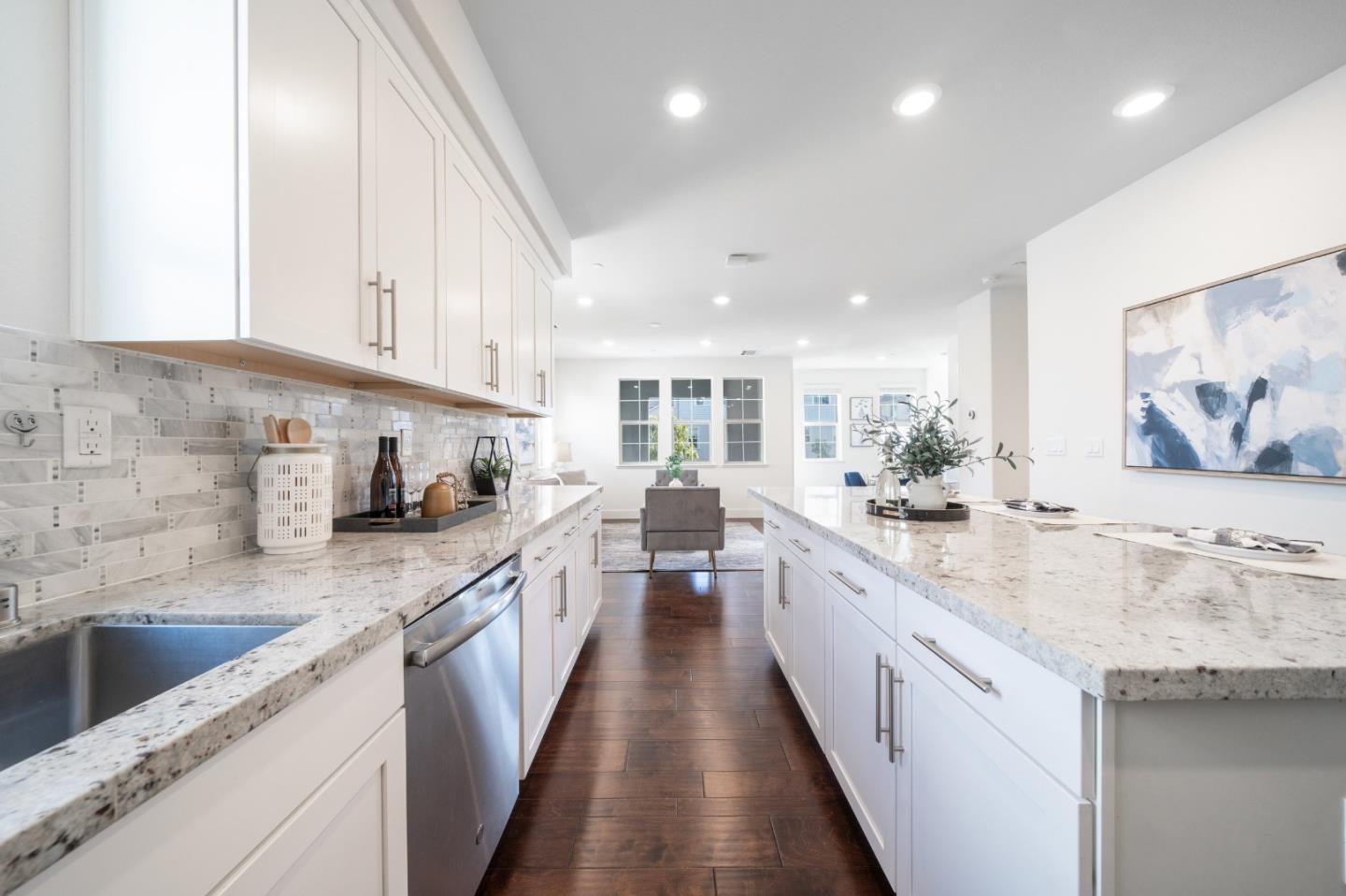 8553 Seawind Way Newark, CA 94560 - Photo 13 of 30 a large kitchen with stainless steel appliances lots of counter space and a sink