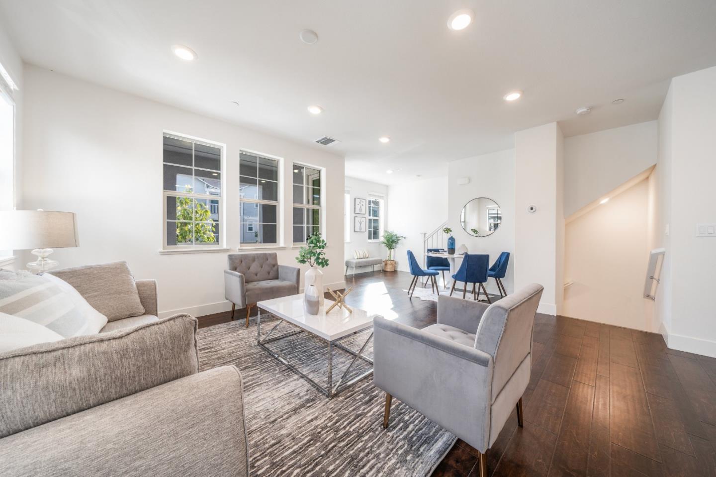 8553 Seawind Way Newark, CA 94560 - Photo 15 of 30 a living room with furniture and wooden floor