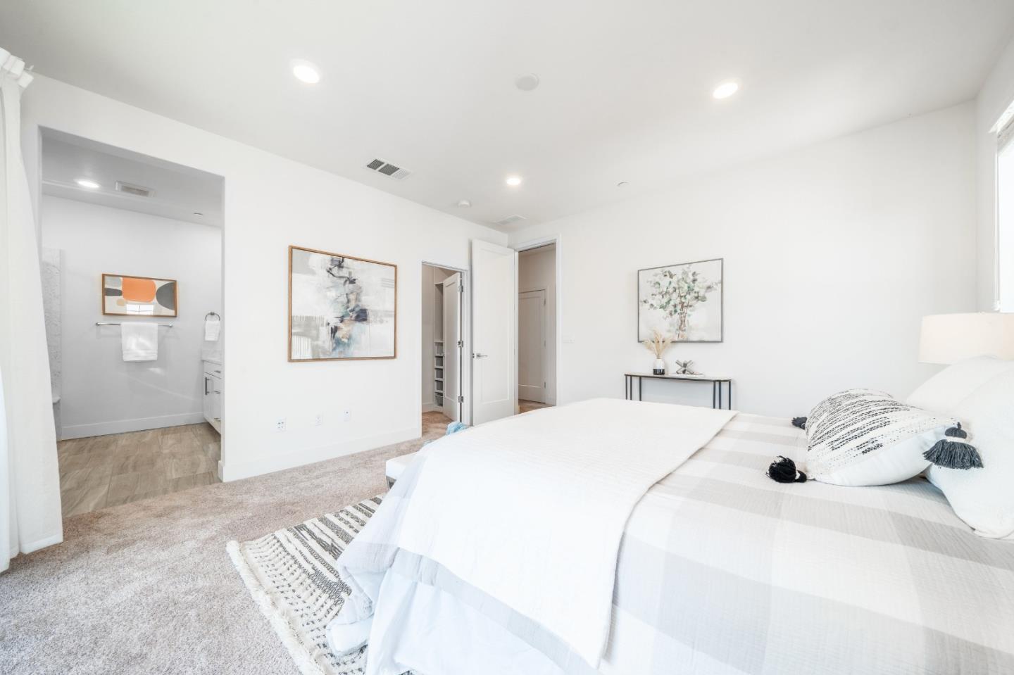 8553 Seawind Way Newark, CA 94560 - Photo 17 of 30 a bedroom with a bed and a painting on the wall