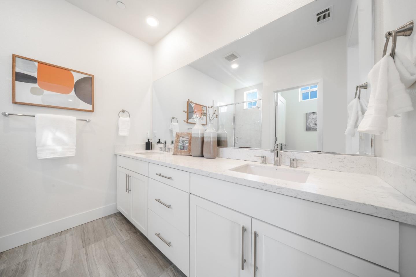 8553 Seawind Way Newark, CA 94560 - Photo 18 of 30 a bathroom with a double vanity sink mirror and