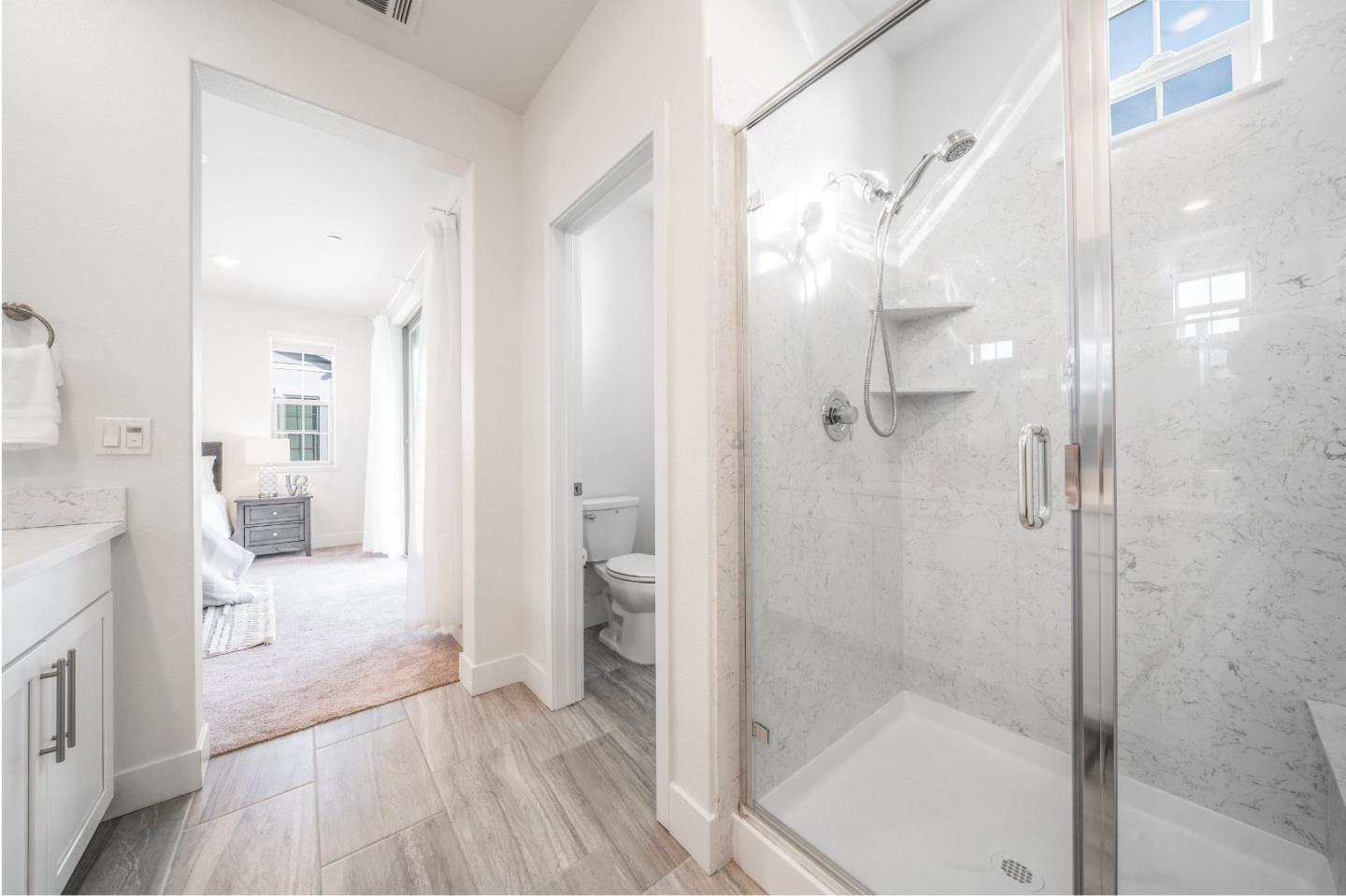 8553 Seawind Way Newark, CA 94560 - Photo 19 of 30 a bathroom with a shower and a toilet