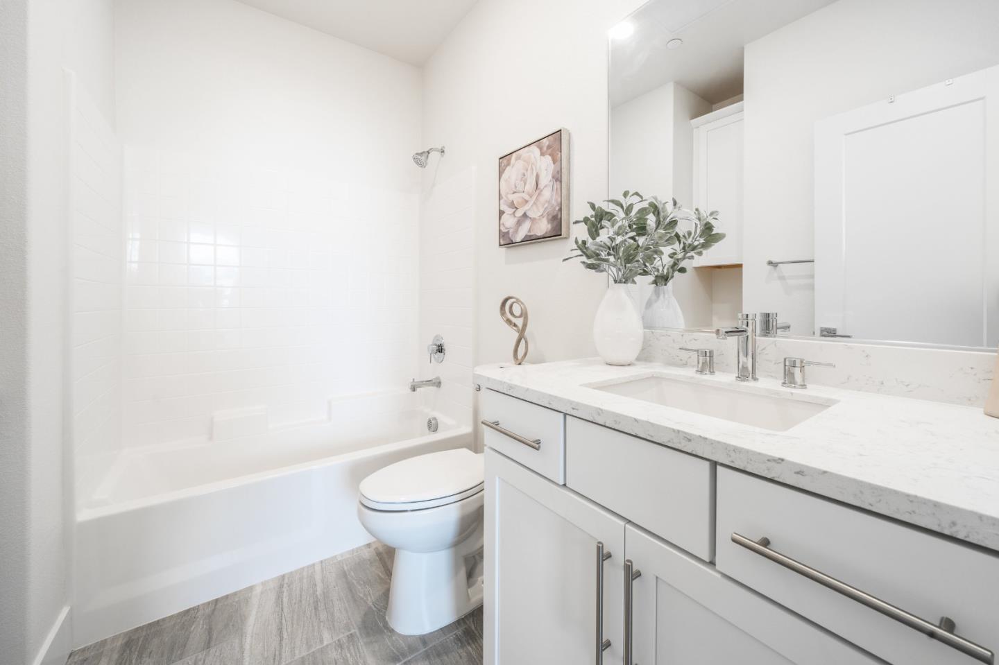 8553 Seawind Way Newark, CA 94560 - Photo 22 of 30 a bathroom with a sink toilet and shower