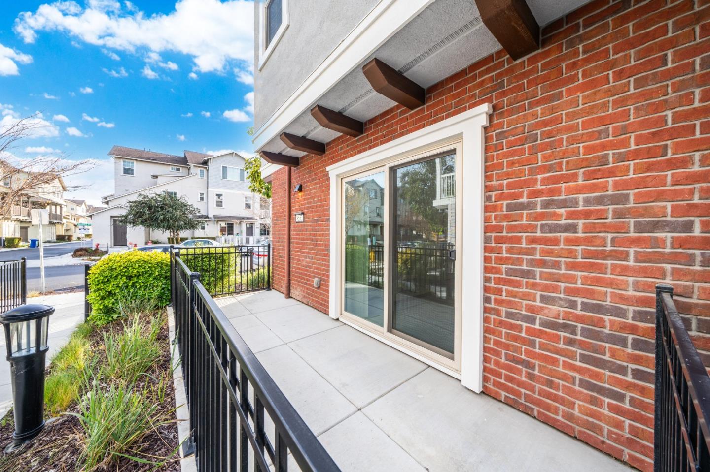 8553 Seawind Way Newark, CA 94560 - Photo 23 of 30 a balcony with furniture and a potted plant